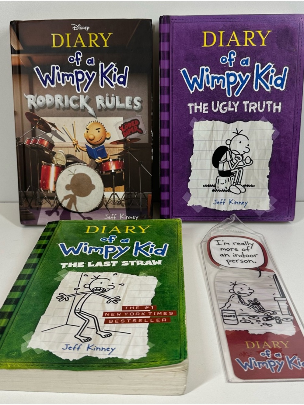 Diary of a Wimpy Kid Books lot (3 Books) And A Diary Of A Wimpy Kid Bookmark